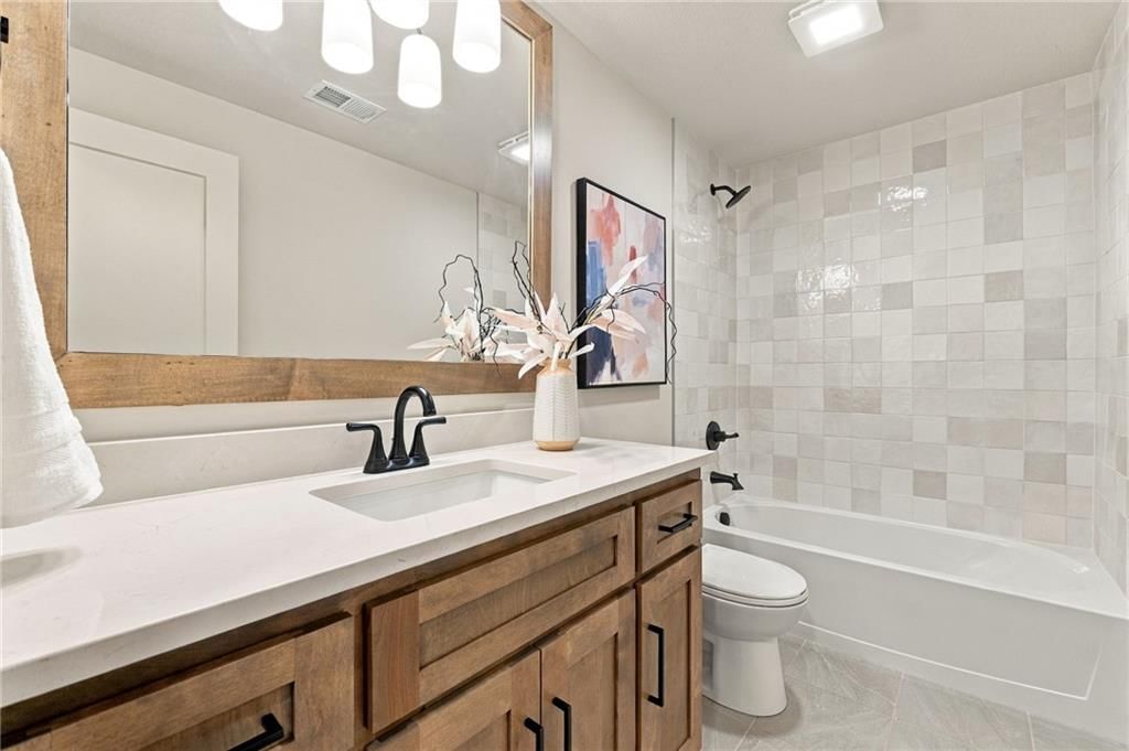 Tiled shower at 4905 W 71st Street, Prairie Village, KS 66208
