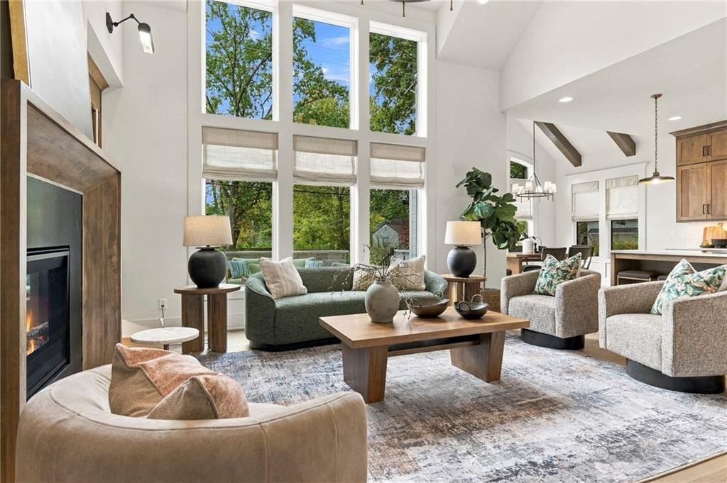 Tall ceilings, fireplace and black fireplace material at 4905 W 71st Street, Prairie Village, KS 66208
