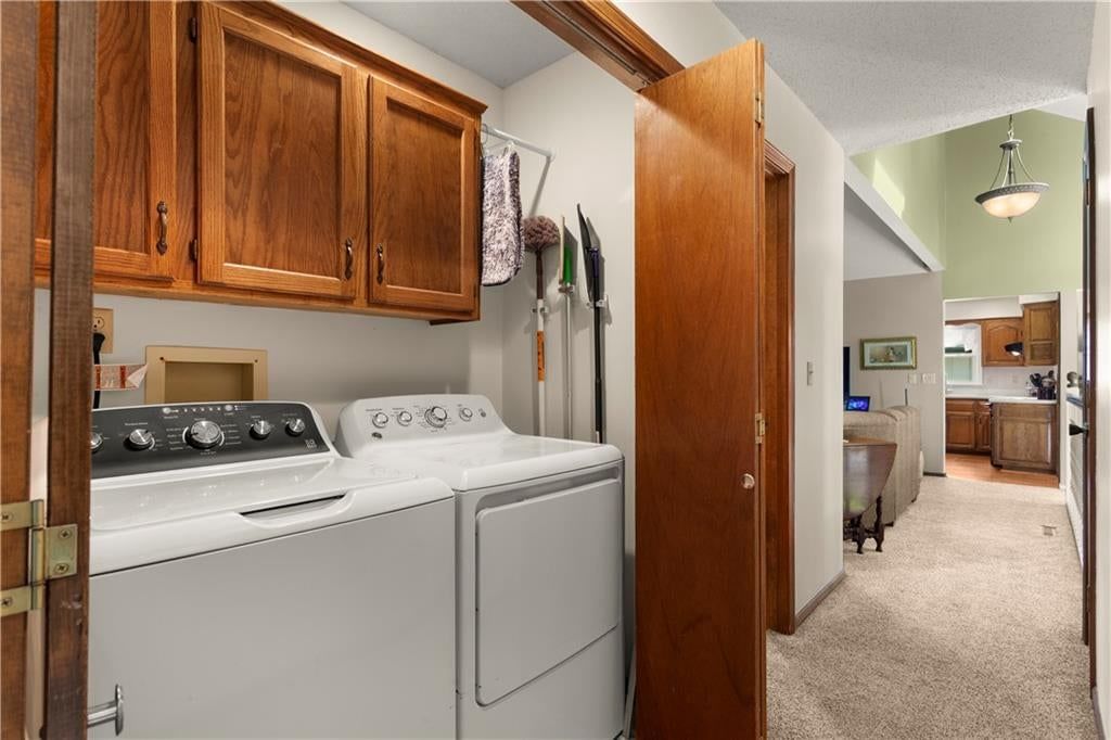 Laundry cabinets at 205 SE Saratoga Drive, Blue Springs, MO 64014