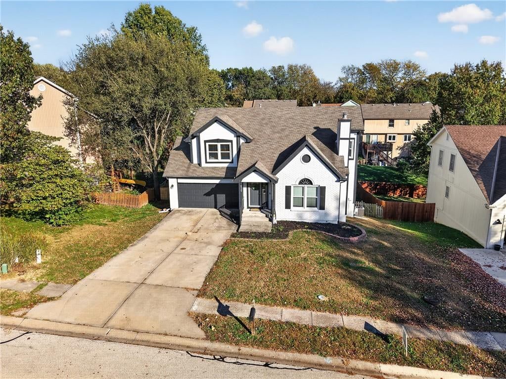Traditional style and mixed exterior materials at 6529 NW Hidden Valley Road, Kansas City, MO 64152