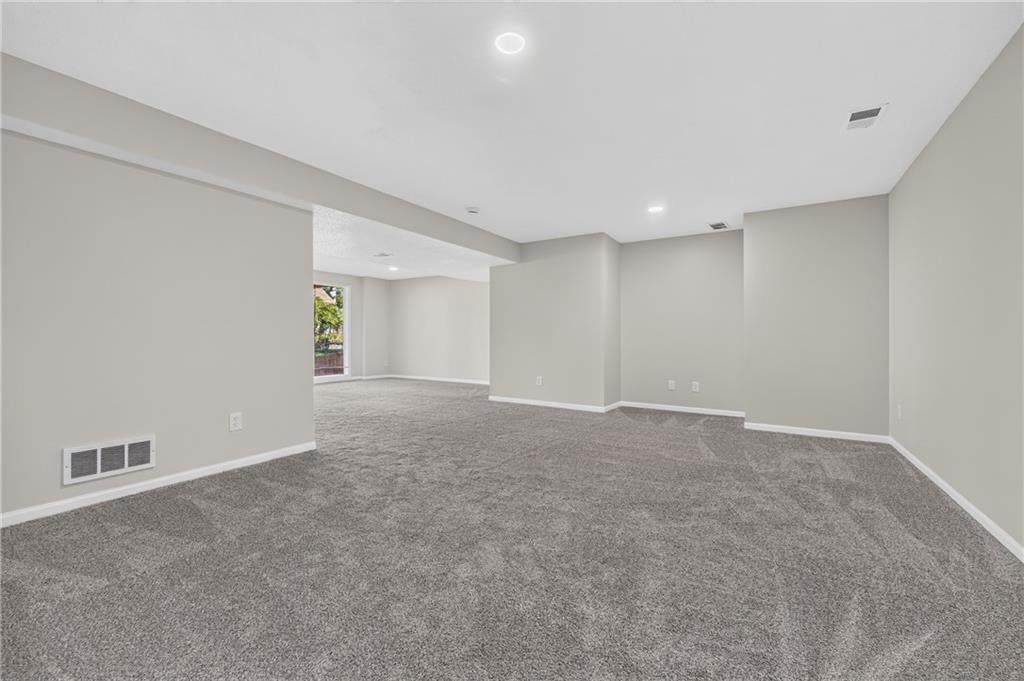 Finished basement and carpet at 6529 NW Hidden Valley Road, Kansas City, MO 64152