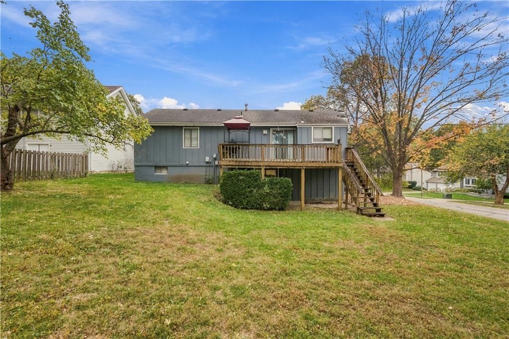 Big backyard, fenced yard and driveway at 14624 W 91st Place, Lenexa, KS 66215