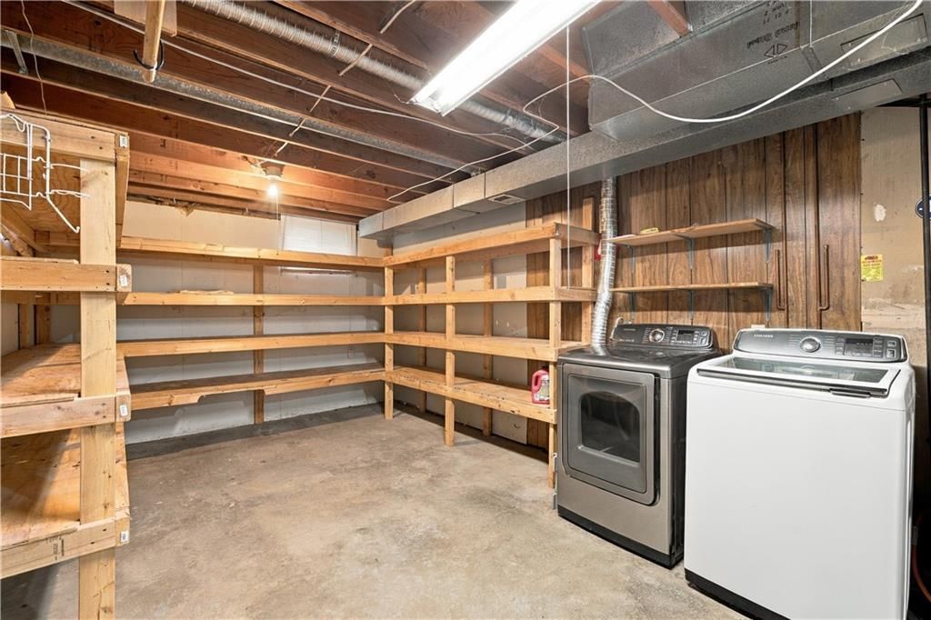 Finished basement and laundry cabinets at 14624 W 91st Place, Lenexa, KS 66215