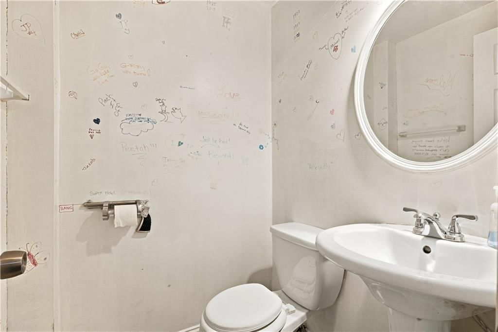 Private toilet room and renovated bathrooms at 14624 W 91st Place, Lenexa, KS 66215