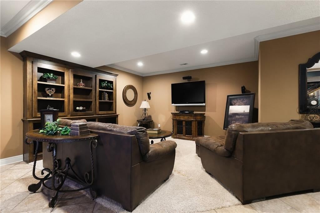 Finished basement and pool table at 1205 NW 43rd Terrace, Kansas City, MO 64116