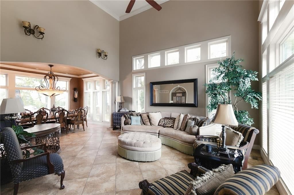 Fireplace, wall of windows and built-ins at 1205 NW 43rd Terrace, Kansas City, MO 64116
