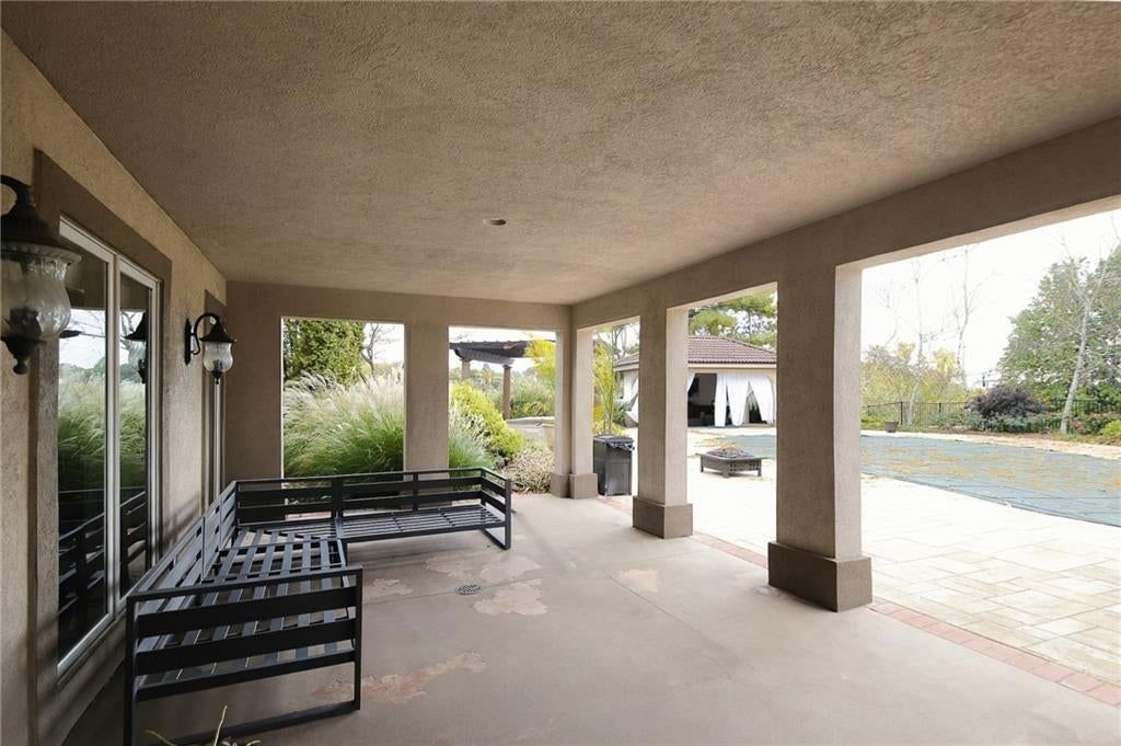 Covered patio at 1205 NW 43rd Terrace, Kansas City, MO 64116