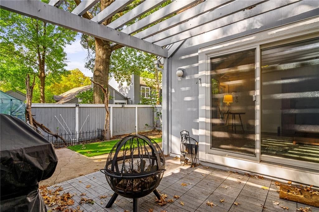 Pergola, fire pit and paver patio at 7900 Colony Lane, Lenexa, KS 66215