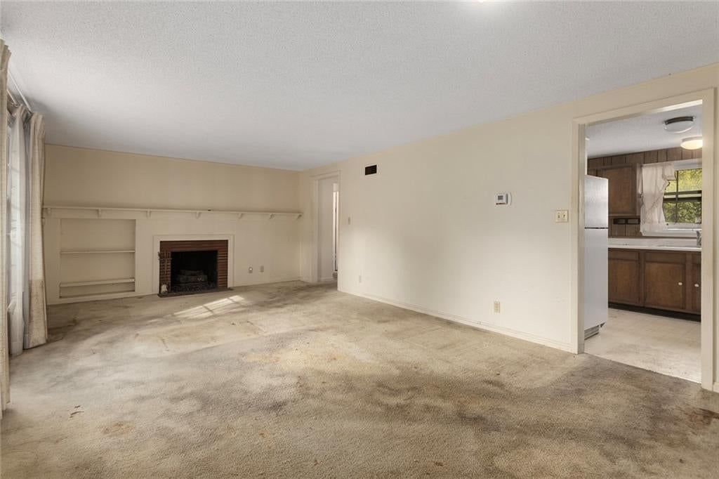 Kitchen open to the living area at 4509 W 75th Street, Prairie Village, KS 66208