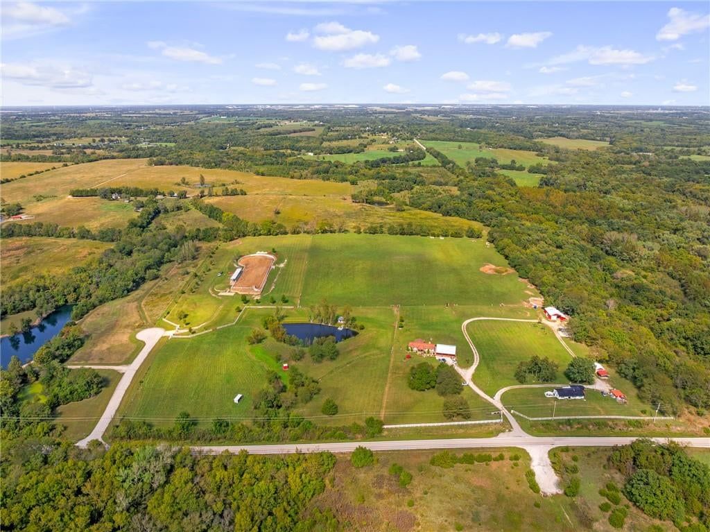 Pond or creek visible on the lot at 24822 W 223 Street, Spring Hill, KS 66083