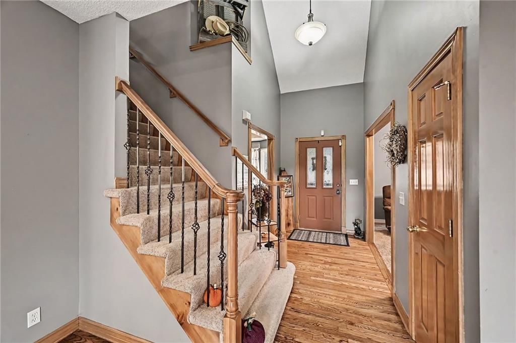 Wood stair railing at 21711 W 51st Place, Shawnee, KS 66226