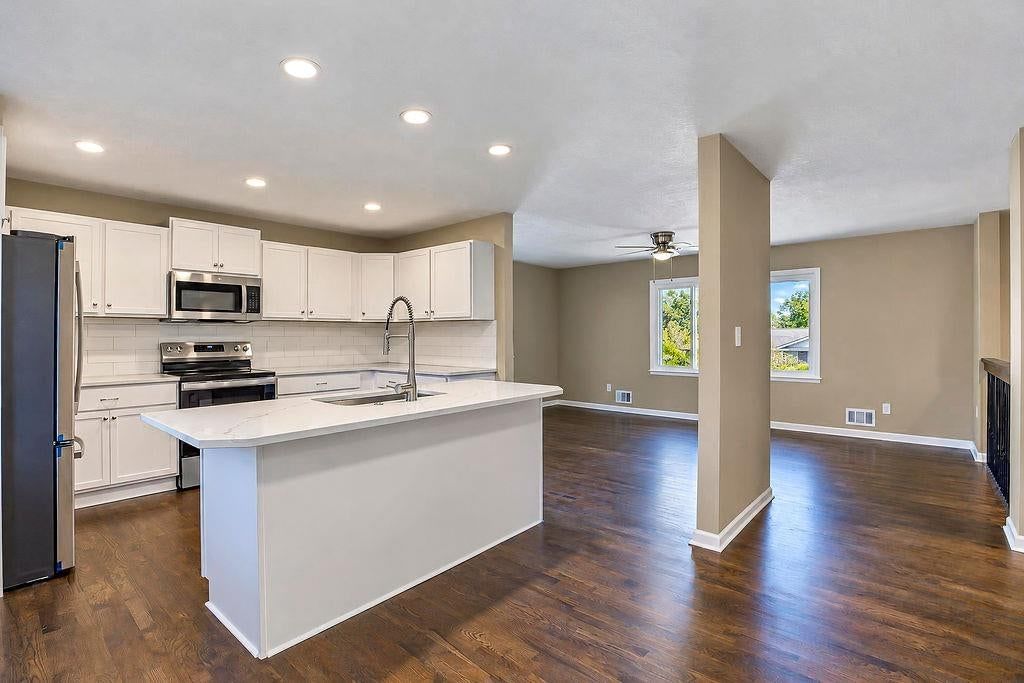 Shaker cabinets, kitchen backsplash and subway tile backsplash at 6516 Ballentine Street, Shawnee, KS 66203