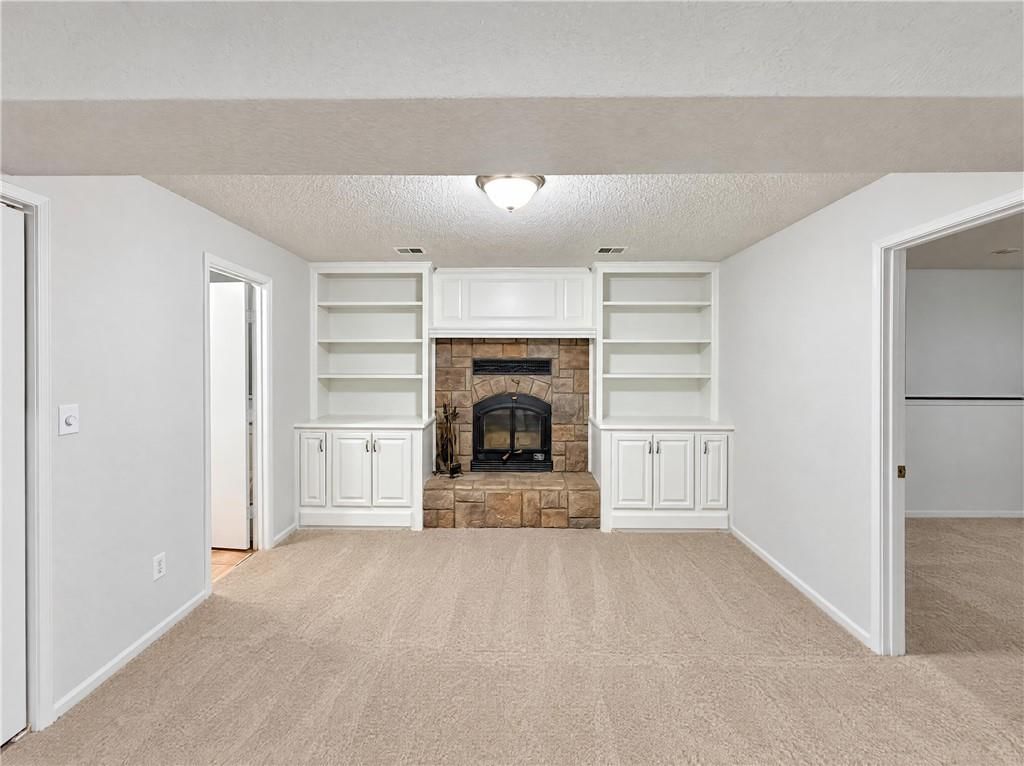 Finished basement and built-ins at 14416 Saint Andrews Drive, Grandview, MO 64030
