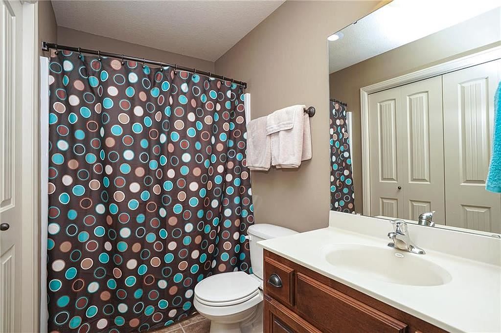 116 NW LEWIS Drive — photo 37