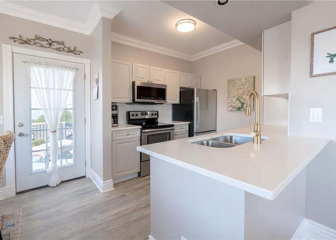 11615 Tomahawk Creek Parkway — photo 4