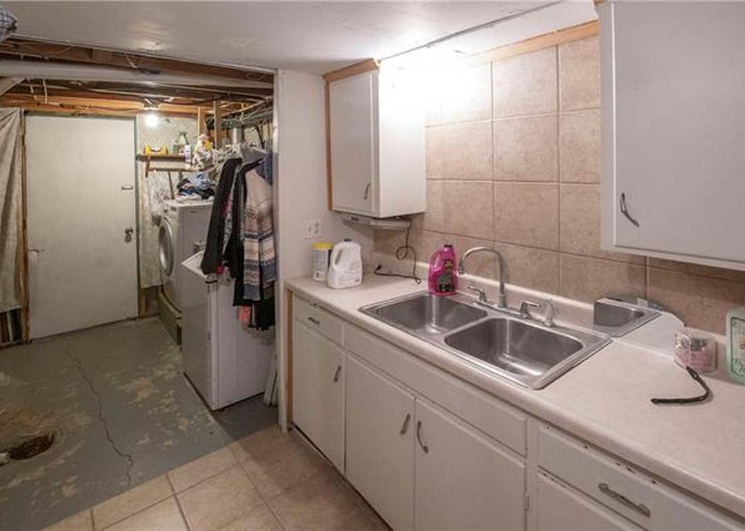 7008 Sloan Avenue — photo 27
